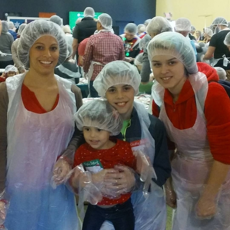 Volunteers packed 240,000 meals, wrapped gifts and collected warm coats for New Jersey's underprivileged families at the Liquid Church Christmas Outreach event, which took place at eight outreach locations including Nutley, Jersey City, Parsippany, Hillsborough, Somerset, Elizabeth, Garwood, and Mountainside, December 5, 2015.