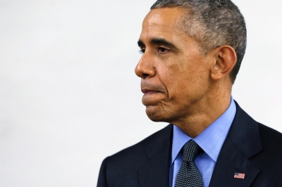 U.S. President Barack Obama pauses during remarks on the recent shootings in San Bernardino, after meeting with victims' families at Indian Springs High School in San Bernardino, California December 18, 2015.