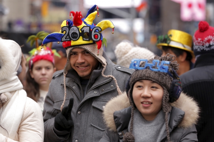 Revelers stand in pens as they await New Year's Eve festivities in the Times Square area of New York, December 31, 2015.