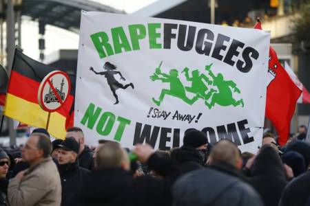 Supporters of anti-immigration right-wing movement PEGIDA (Patriotic Europeans Against the Islamisation of the West) take part in in demonstration rally, in reaction to mass assaults on women on New Year's Eve, in Cologne, Germany, January 9, 2016.