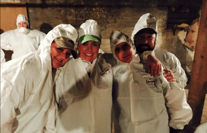 Volunteers cleaning up a basement at a men's shelter in Tennessee as part of the annual ecumenical community volunteer event 'Mission Blitz.'