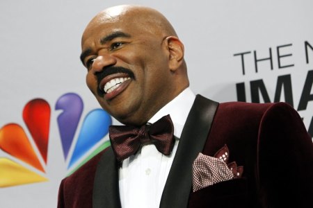 Host Steve Harvey smiles as he poses in the media room at the 44th NAACP Image Awards at the Shrine Auditorium in Los Angeles, California, February 1, 2013.