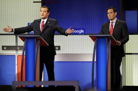 Republican U.S. presidential candidate U.S. Senator Ted Cruz (L) speaks as Senator Marco Rubio listens at the debate held by Fox News for the top 2016 U.S. Republican presidential candidates in Des Moines, Iowa January 28, 2016.