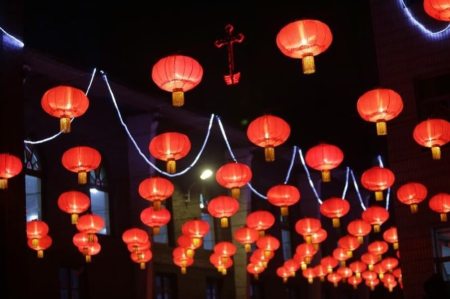 A cross is seen on the top of a Catholic church decorated with red lanterns near the city of Taiyuan, Shanxi province, December 24, 2012.