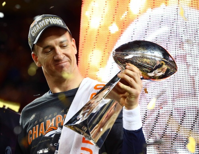 Denver Broncos quarterback Peyton Manning (18) hoists the Vince Lombardi Trophy after defeating the Carolina Panthers in Super Bowl 50 at Levi's Stadium, Santa Clara, California, February 7, 2016.