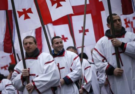 Participants march on the street during 'Alilo,' a religious procession to celebrate Orthodox Christmas in Tbilisi, Georgia, January 7, 2016. Georgian Orthodox believers celebrate Christmas on January 7, according to the Julian calendar.