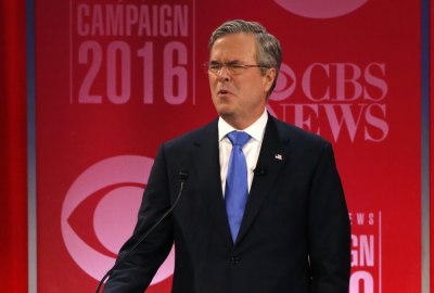 Republican U.S. presidential candidate former Governor Jeb Bush reacts to an attack from rival candidate businessman Donald Trump (not pictured) at the Republican U.S. presidential candidates debate sponsored by CBS News and the Republican National Committee in Greenville, South Carolina February 13, 2016.