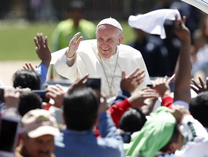 Pope Francis waves to the crowd after celebrating a Mass at San Cristobal de las Casas, Mexico, February 15, 2016.