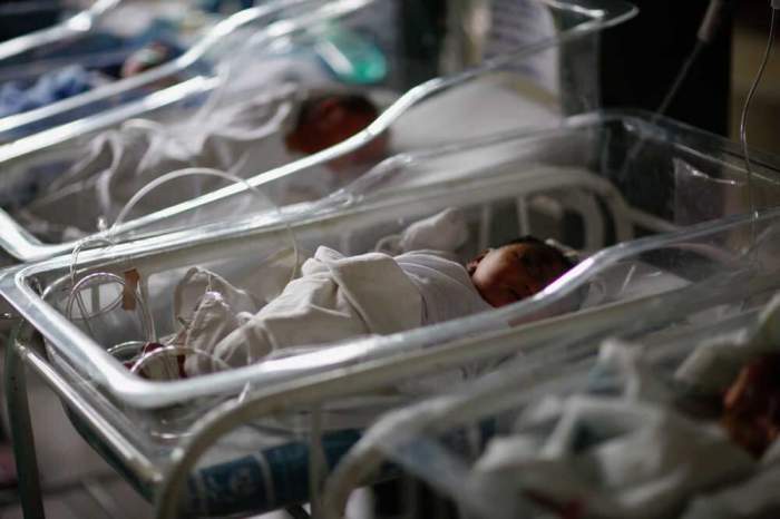 Newborn babies sleep in cribs inside a hospital in Tacloban City, in central Philippines November 13, 2013, five days after Typhoon Haiyan devastated the area. Many of the 80 babies born in the hospital since the typhoon came prematurely, their mothers shocked into labour by Friday's trauma.