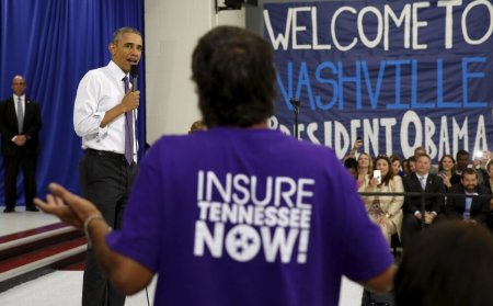 U.S. President Barack Obama takes a question as he speaks about the Affordable Care Act during a visit to Taylor Stratton Elementary School in Nashville, Tennessee July 1, 2015.