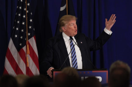 U.S. Republican presidential candidate Donald Trump speaks to voters at a rally at the Turtle Point Golf Club in Kiawah Island, South Carolina, February 18, 2016.