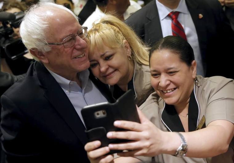 U.S. Democratic presidential candidate Bernie Sanders greets workers at the MGM Grand Hotel and Casino in Las Vegas, Nevada, February 20, 2016.