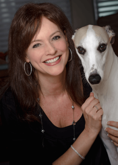 Jennifer Wilder Morgan poses with her dog in promotional photo for 'Come to the Garden', 2016.