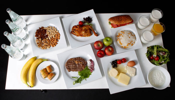 The daily meal intake of Turkish javelin thrower and Olympic hopeful Fatih Avan, 23, is pictured in Ankara May 29, 2012. Avan made the world's second best throw of 2012 but the Olympic Games have a special place in his heart. 'I may have become an elite athlete with my good performances but I can only be a great athlete if I can win an Olympic medal,' he says. Avan complements his rigorous training schedule with a nutritional programme which gives him a daily intake of 3500 kcal. His diet is mainly protein-based. 'A good diet is essential for power. A correct and consistent diet proves its value in my training,' he says. Picture taken May 29, 2012.