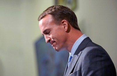 Denver Broncos quarterback Peyton Manning reacts during his retirement announcement press conference at the UCHealth Training Center, Englewood, Colorado, March 7, 2016.