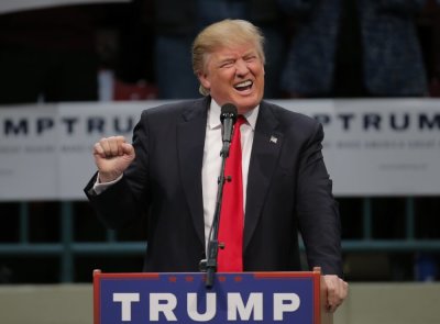 U.S. Republican presidential candidate Donald Trump gestures as he speaks during a campaign event in Concord, North Carolina March 7, 2016.