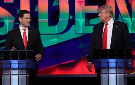 Republican U.S. presidential candidate Marco Rubio (L) grimaces at rival Donald Trump during the Republican U.S. presidential candidates debate sponsored by CNN at the University of Miami in Miami, Florida March 10, 2016.