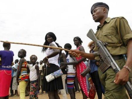 Undated photo of South Sudanese armed forces, women and children.