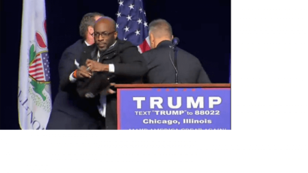 Jedidiah Brown storms onto the stage before a Donald Trump campaign rally at the University of Illinois at Chicago on March 11, 2016.