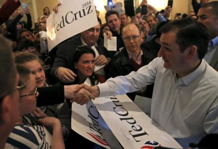 U.S. Republican presidential candidate Ted Cruz greets supporters at a campaign rally in Glen Ellyn, Illinois, March 14, 2016.