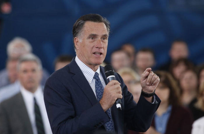 Former Republican U.S. presidential nominee Mitt Romney introduces current Republican presidential candidate John Kasich at a campaign rally in North Canton, Ohio, March 14, 2016.