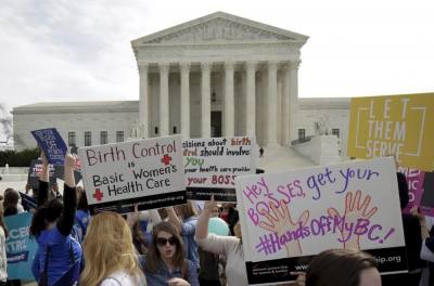 Supporters of contraception rally before Zubik v. Burwell, an appeal brought by Christian groups demanding full exemption from the requirement to provide insurance covering contraception under the Affordable Care Act, is heard by the U.S. Supreme Court in Washington March 23, 2016.