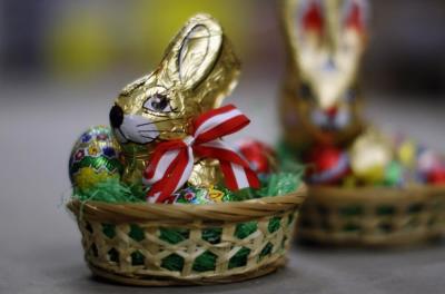 Easter baskets with easter chocolate bunnies and eggs are pictured at the Hauswirth confectioner factory in Kittsee, some 60 km (37 miles) east of Vienna, March 24, 2011. Hauswirth GesmbH processes 20 tons of chocolate per day during peak seasons and exports its products mainly to South Africa and Australia.