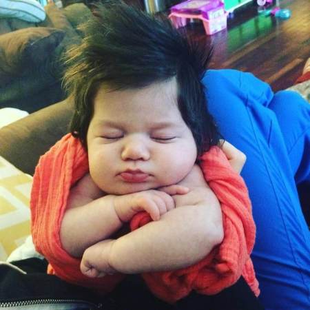 Baby Collyns Lorelei Cox's big hair brings her closer to Jesus her family says.