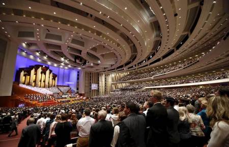 The Mormon Tabernacle Choir and conference goers sing at the first session of the The Church of Jesus Christ of Latter-day Saints' 185th Annual General Conference in Salt Lake City, Utah April 4, 2015.