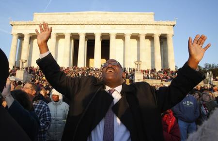 Christians pray during an Easter morning sunrise religious service on the steps of the Lincoln Memorial in Washington, D.C., April 5, 2015.