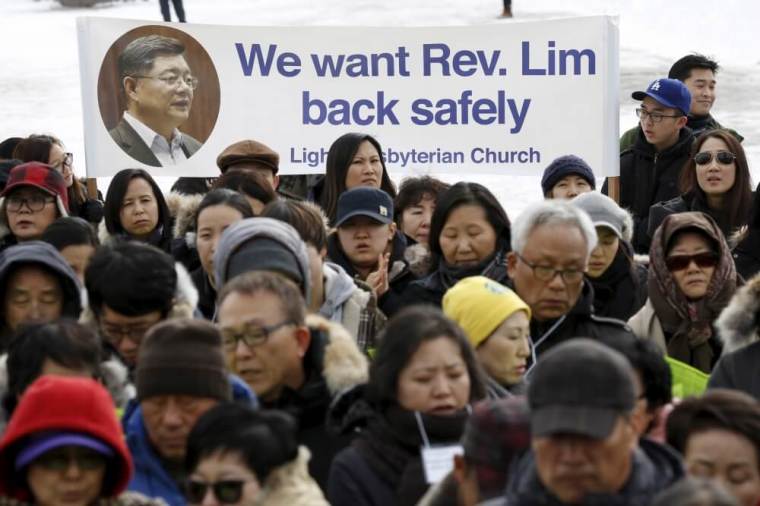 People take part in a demonstration for Canadian Pastor Hyeon Soo Lim, who is being held in North Korea, on Parliament Hill in Ottawa, Canada, February 17, 2016.