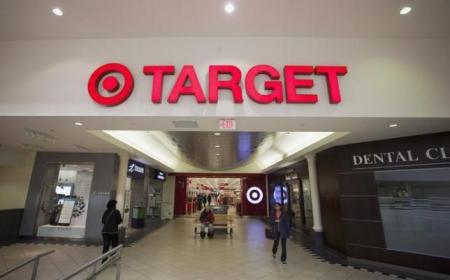 People are seen in front of a Target store in Delta, British Columbia January 15, 2015.