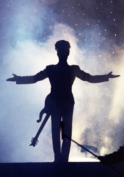 Prince performs during his 'Diamonds and Pearls Tour' at the Earl's Court Arena in London, Britain, June 15, 1992.