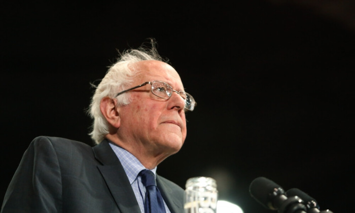 Democratic U.S. presidential candidate and U.S. Senator Bernie Sanders pauses as he speaks to supporters during his five state primary night rally held in Huntington, West Virginia, U.S., April 26, 2016.