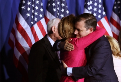 Republican U.S. presidential candidate Ted Cruz hugs running-mate Carly Fiorina just before announcing that he is suspending his campaign for president at a campaign event during Indiana primary night in Indianapolis, Indiana, U.S., May 3, 2016.