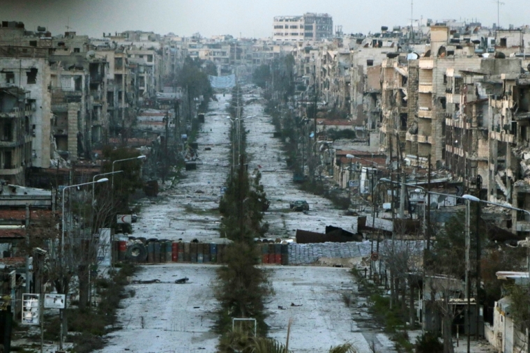 A general view shows a damaged street with sandbags used as barriers in Aleppo's Saif al-Dawla district, Syria, March 6, 2015.