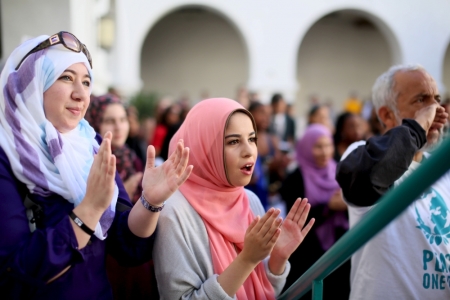 Yesmeena Buzeriba (C) chants along with other students at a rally against Islamophobia at San Diego State University in San Diego, California, November 23, 2015.