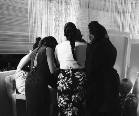 Israel Houghton pictured praying with the cast of 'The Real' talk show in an image posted by girlfriend Adrienne Bailon on May 5, 2016.