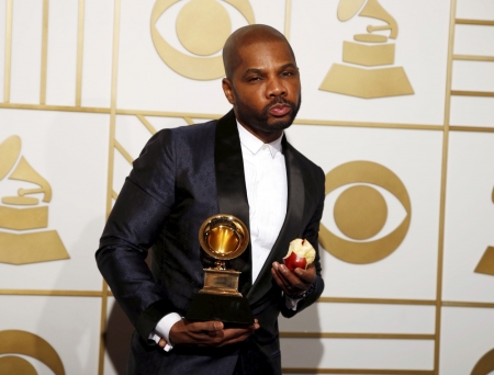 Kirk Franklin poses with the award for Best Gospel Performance/Song for 'Wanna Be Happy?' during the 58th Grammy Awards in Los Angeles, California, February 15, 2016.