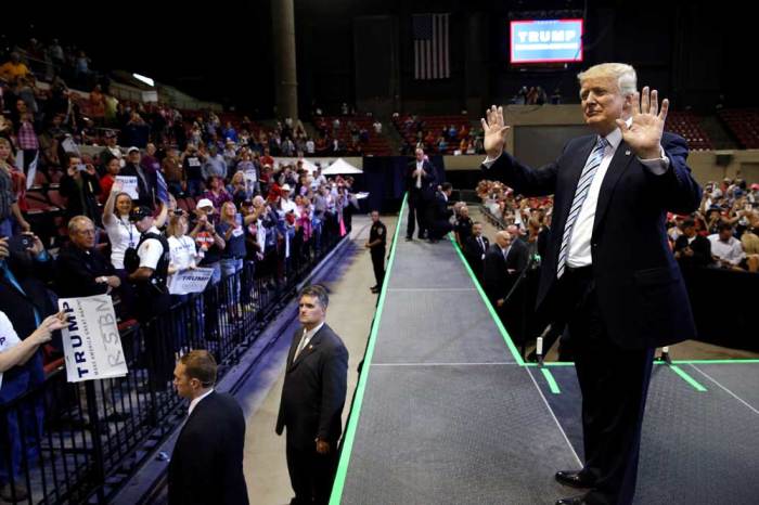 Republican U.S. presidential candidate Donald Trump departs after a rally with supporters in Billings, Montana, U.S. May 26, 2016.