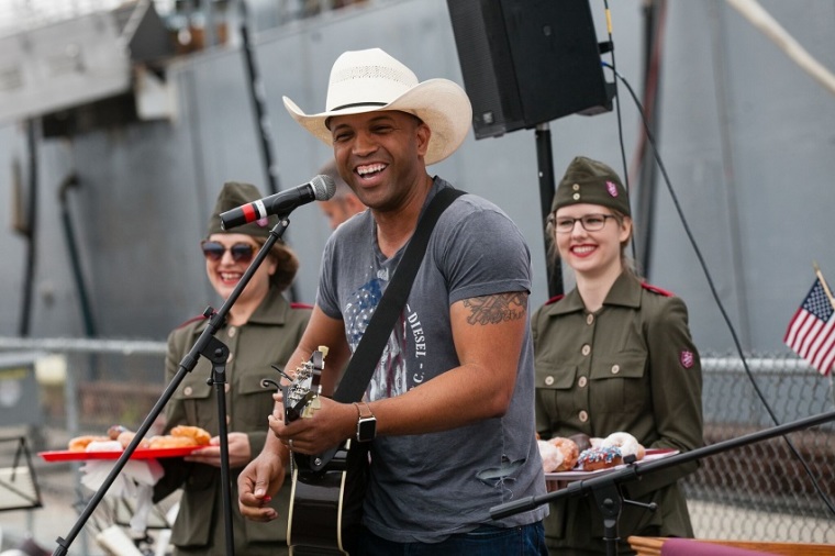 Singer songwriter Coffey Anderson sang the National Anthem and his hit, Mr Red White and Blue at Salvation Army event in Los Angeles.