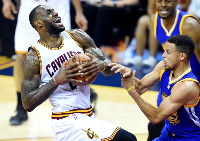 Cleveland Cavaliers forward LeBron James (23) drives to the basket against Golden State Warriors guard Stephen Curry (30) during the first quarter in game four of the NBA Finals at Quicken Loans Arena in Cleveland, Ohio, June 10, 2016.