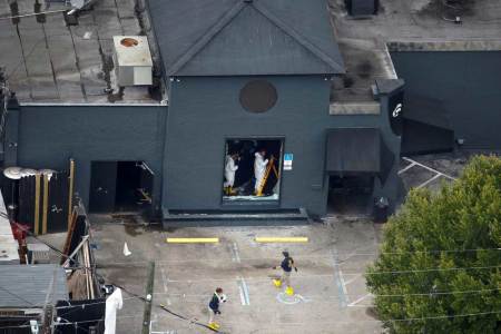 Federal Bureau of Investigation (FBI) officials collect evidence from the Pulse gay night club, the site of a mass shooting days earlier, in Orlando, Florida, U.S., June 15, 2016.