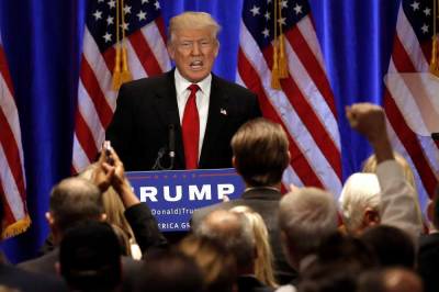 Republican presidential candidate Donald Trump is cheered by supporters as he delivers a speech at the Trump Soho Hotel in Manhattan, New York City, U.S., June 22, 2016.