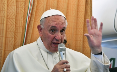 Pope Francis speaks to journalists on his flight back to Rome following a visit at Armenia on June 26, 2016.