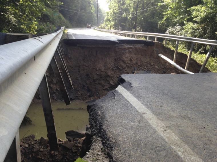 The West Virginia State Highway 4 along the Elk River shows extensive damages after flood water has dropped in the Clendenin, West Virginia, U.S., June 25, 2016. hit by flooding.