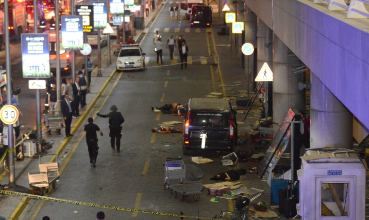 Bodies are seen outside Turkey's largest airport, Istanbul Ataturk, Turkey, following a blast, June 28, 2016.