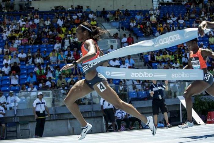 English Gardner of the U.S. crosses the finish line to win the 100m at the IAAF Diamond League Grand Prix track and field competition in New York June 13, 2015.