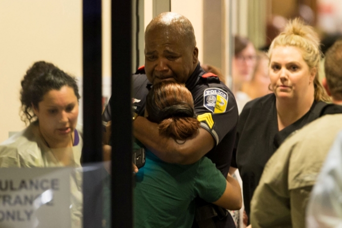 A DART (Dallas Area Rapid Transit) police officer at the Baylor University Hospital emergency room entrance in Dallas.