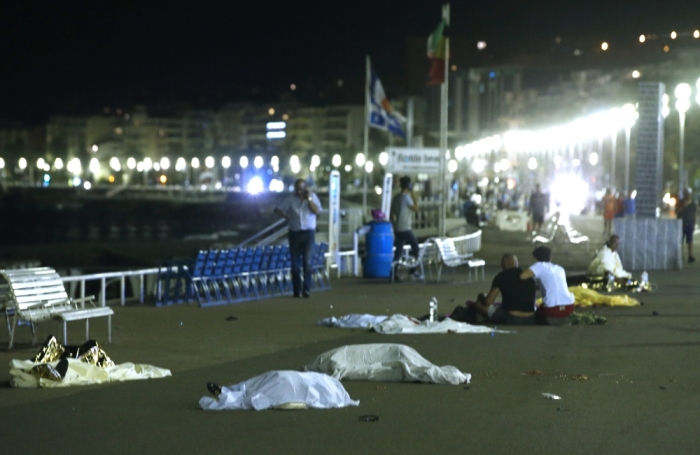 Bodies are seen on the ground July 15, 2016, after at least 30 people were killed in Nice, France, when a truck ran into a crowd celebrating the Bastille Day national holiday, July 14, 2016.